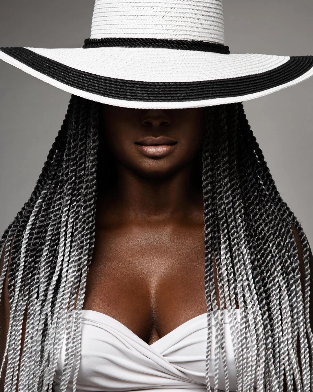 Fashion Portrait mit Hut und Braids